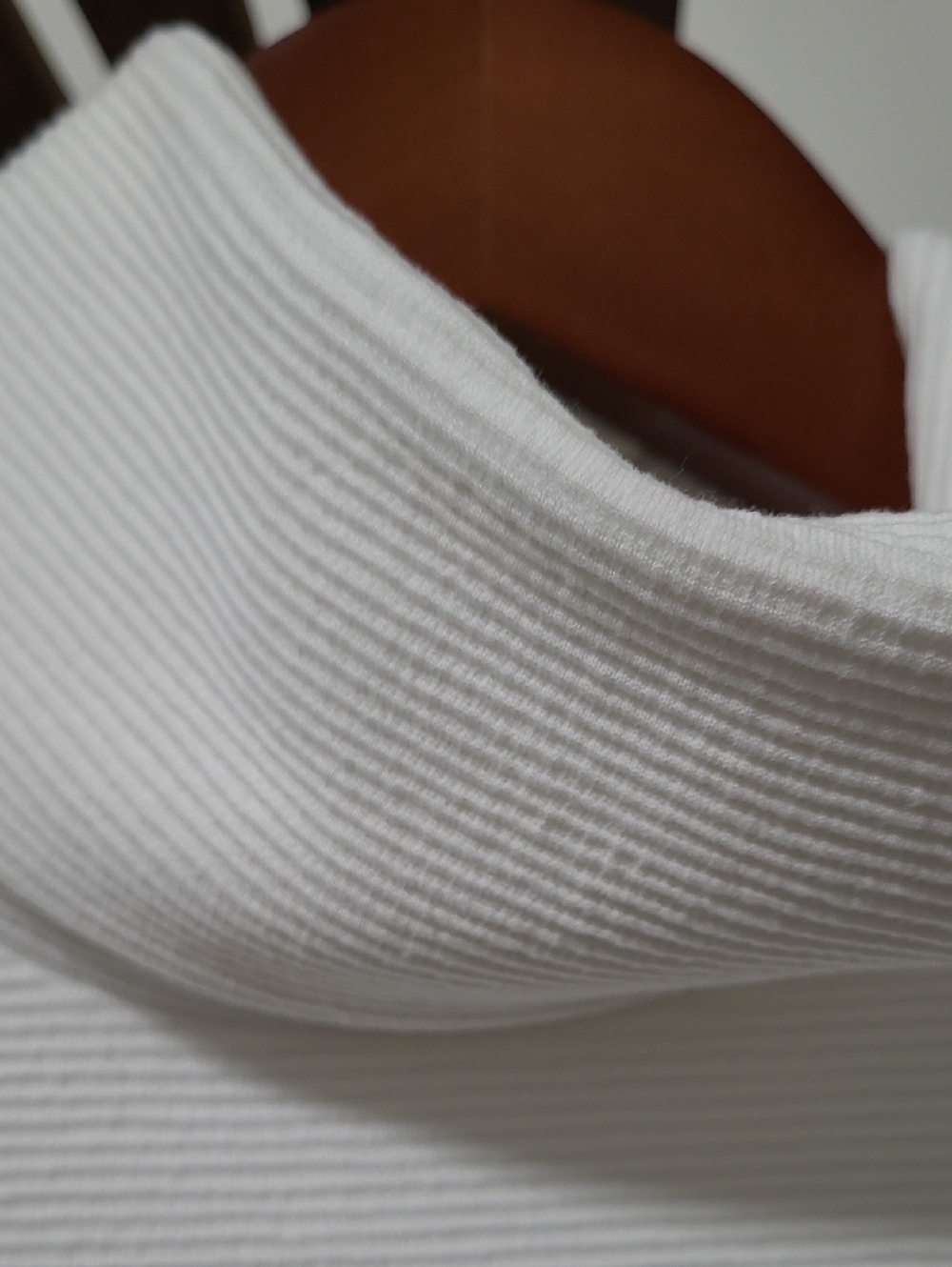 Sophisticated White Sleeveless Ribbed Knit Turtleneck Top - Picture 10 of 11